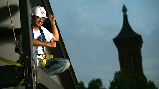 Danny Bass tips his hard hat -- a job well done.